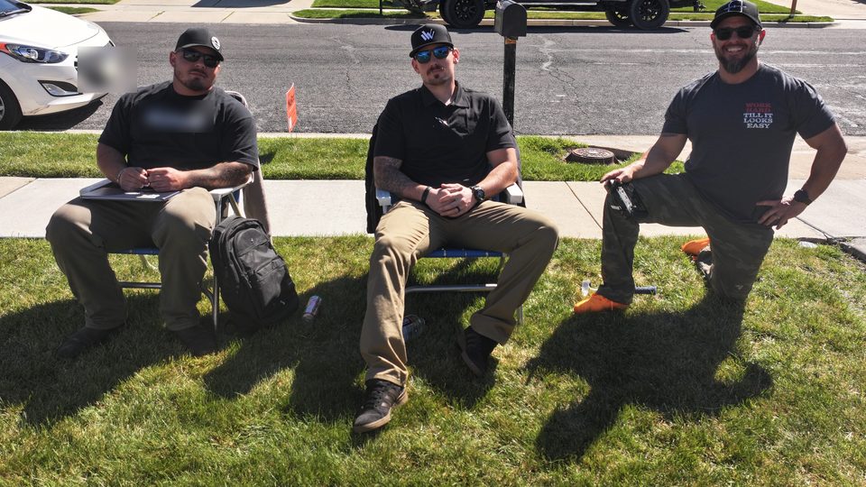 The NuRoof Guys crew on a Utah job site lawn.